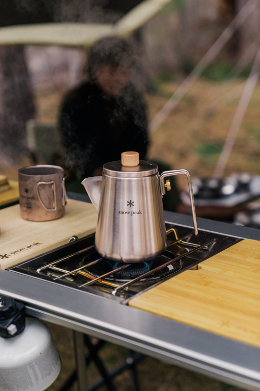 Kettle heating on a Snow Peak Flat Burner outdoors