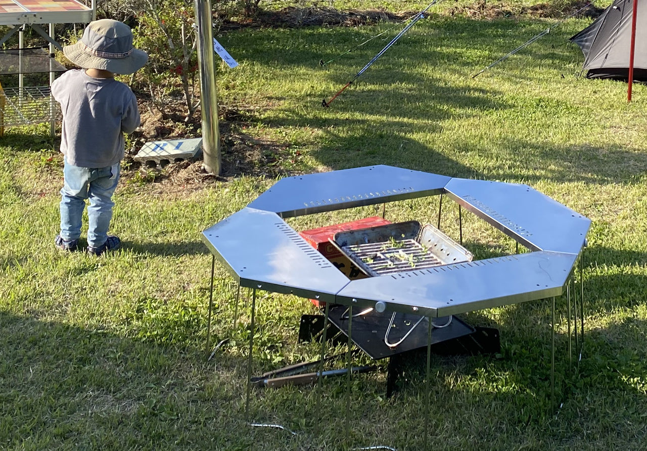 Jikaro Firering Table surrounds the Fire & Grill